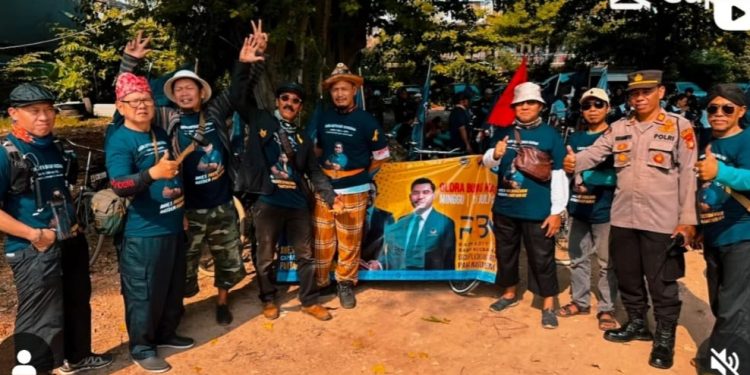 Hadiri Apel Siaga NasDem, Bacaleg Milenial Aditya Barkah Dikawal Komunitas Sepeda Ontel