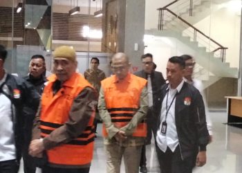 KPK Tahan 2 Tersangka Korupsi Haji Ismail Adham Maktour dan Asrul Azis Kesthuri